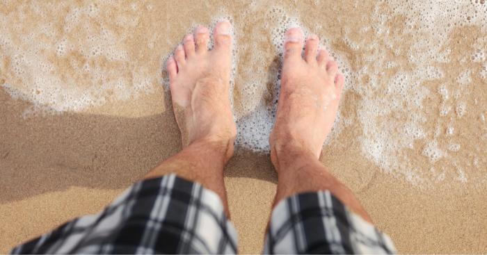 cured athletes foot with silka cream now has healthy feet on beach