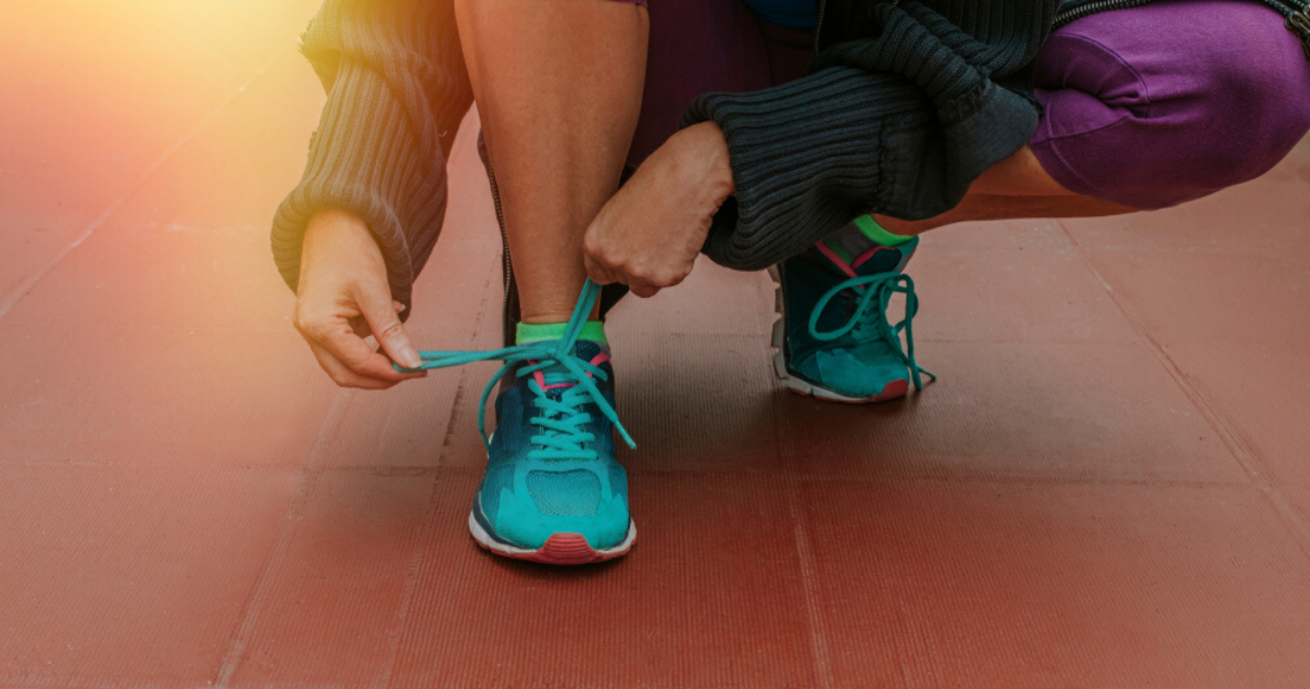 woman paying attention to athletes foot tips by wearing clean shoes that fit