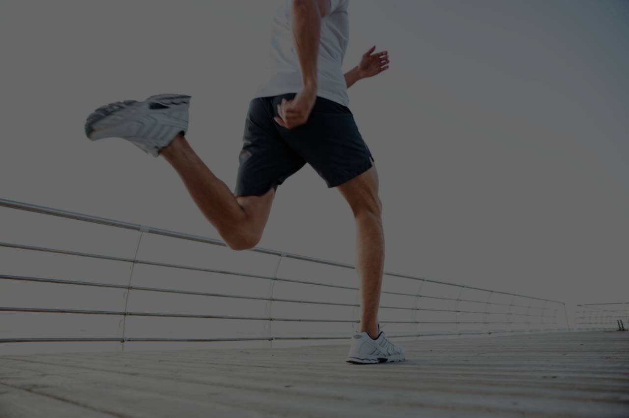 man with athletes foot caused by running in gym shoes athletes foot image